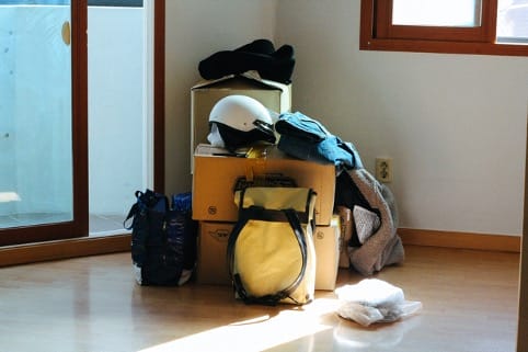 backpack and boxes on the floor